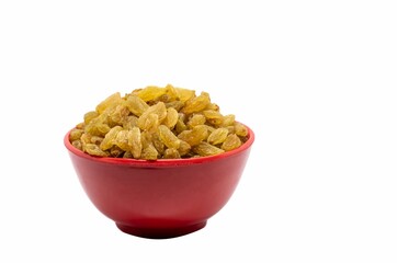 Closeup of Golden Raisin in a Red Bowl Isolated on White Background with Copy Space