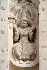 Carvings of Hindu God sculpture carved in the walls of ancient Kanchi Kailasanathar temple in...
