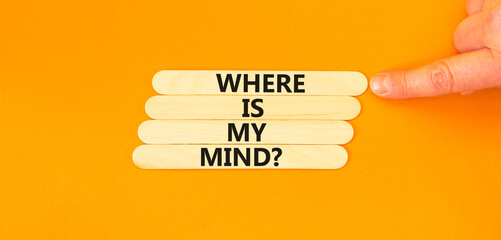 Where is my mind symbol. Concept words Where is my mind on beautiful wooden stick. Beautiful orange table background. Businessman hand. Business, motivational and where is my mind concept. Copy space.