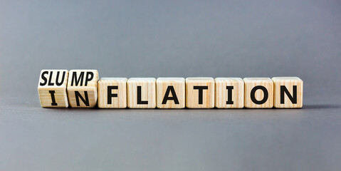 Inflation or slumpflation symbol. Concept word Inflation Slumpflation on beautiful wooden cubes. Beautiful grey table grey background. Business inflation slumpflation concept. Copy space.