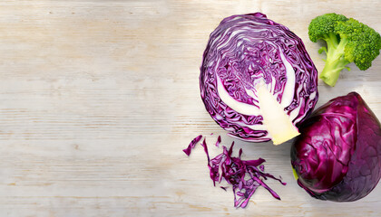 Top view sliced red cabbage on light wooden background with copy space - Powered by Adobe