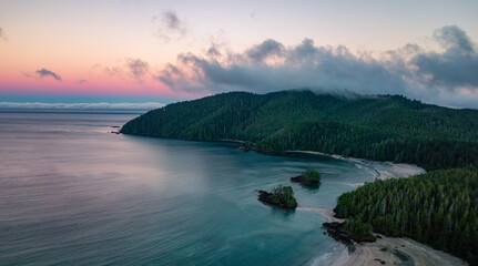 Sandy shore on Pacific Ocean West Coast. Sunrise. Vancouver Island, BC, Canada.