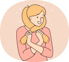 Cute teenager girl wrapping hair around face smiles and dreams about guy she likes from school. Young woman dreams about meeting boyfriend or getting good grades at university