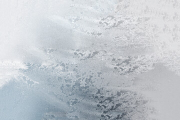 Snowy glass closeup in winter.