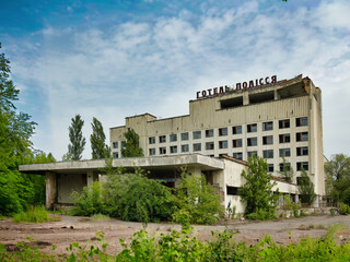 Fototapeta na wymiar Overview of abandoned buildings in the spooky city of Pripyat (Ukraine) famous for the Chernobyl disaster, in its exclusion zone, still radioactive and dangerous