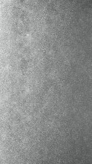 Close-Up View of a Textured Grey Fabric Surface in Soft Light