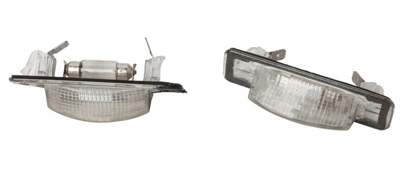 spare part from the car on a white isolated background is a cover for the illumination of a...