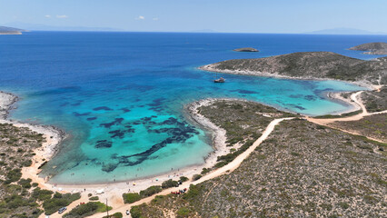 Aerial drone photo of paradise secluded beaches in Southern part of Antiparos island with crystal clear sea, Cyclades, Greece