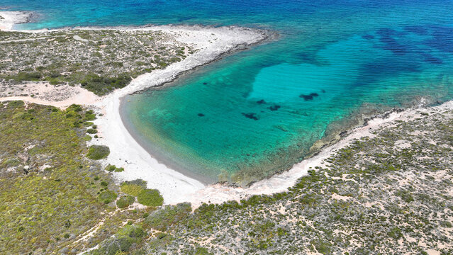Aerial drone photo of paradise secluded beaches in Southern part of Antiparos island with crystal clear sea, Cyclades, Greece
