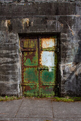 Gritty Rusted green metal door