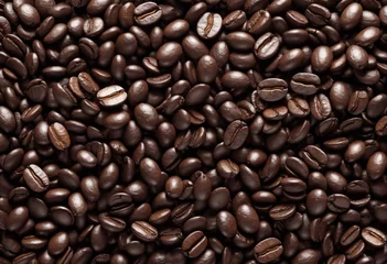 Foto op Aluminium Flying coffee beans background. Close-up brown coffee beans banner. Closeup coffee grains background © SR07XC3