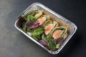 Delivery of salmon and fish dishes. Close-ups