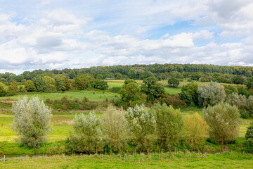Summer landscape view, Hilly countryside of Zuid-Limburg with small villages on the hillside, farmland and forest, Epen is a village in the southern part of the Dutch province of Limburg, Netherlands.