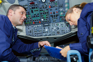 team of aircraft panel technicians