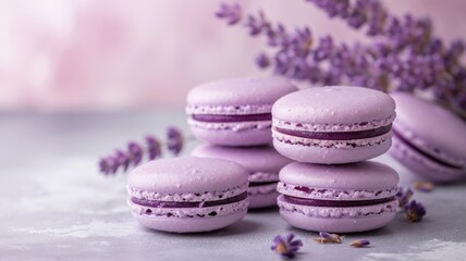 Obraz na płótnie Canvas Stack of purple macarons decorated with lavender on a festive background