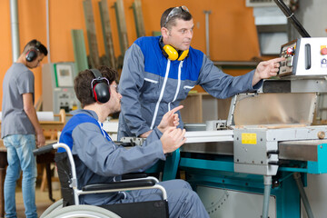 worker in wheelchair in a factory