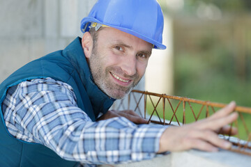 portrait of male engineer at construction site