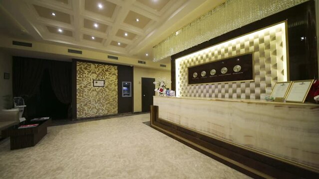 Lights turn off and turn on above the reception with clocks 