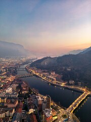 Aerial view of the beginning of the Adda River and the bridges of Lecco, Italy.