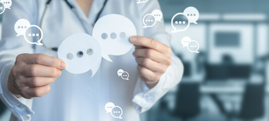 Doctor shows bubbles in front of hospital call center.