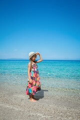 A happy child by the sea in nature weekend travel