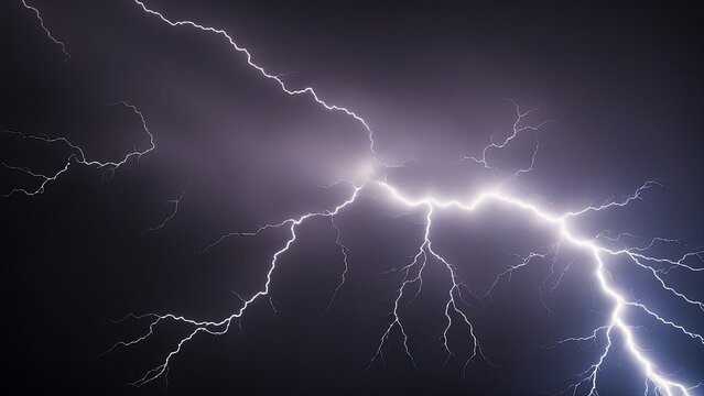 lightning in the night  A bright white electricity lightning flash thunder isolated on a dark black background, 
