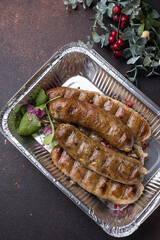 Delivery of delicious sausages. Close up