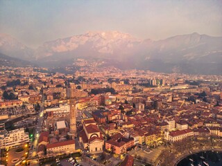 Drone shot of the city of Lecco, Italy, at dusk.
