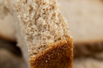 a loaf of dark rye sour bread in the kitchen