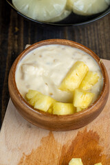 pineapple yogurt with slices of ripe yellow pineapple pineapples with fresh yogurt