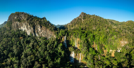 aerial panorama view above the top of Thi Lor Su waterfall..beautiful mountain range in...