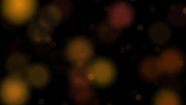 Abstract Gold blurry bokeh background with lights particles on dark background. 4k animation footage