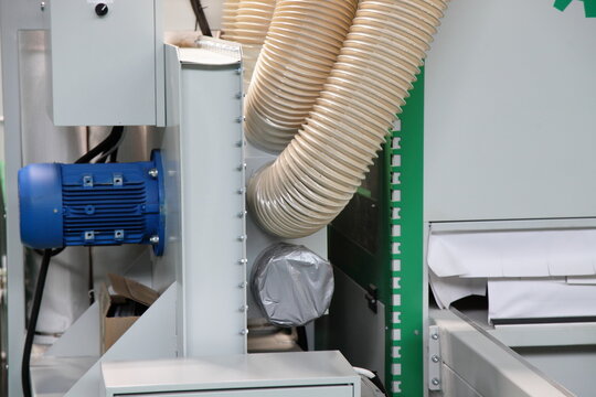 Dust removal ventilation system of the woodworking machine - Big plastic pipes and powerful electric motor 