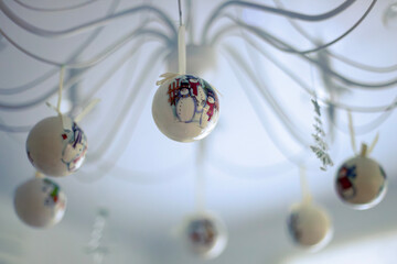 Festive glass balls decorated the chandelier