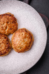 Delicious fresh fried minced fish cutlets with spices and herbs
