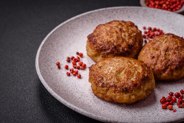 Delicious fresh fried minced fish cutlets with spices and herbs