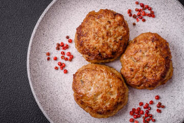 Delicious fresh fried minced fish cutlets with spices and herbs