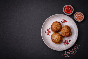 Delicious fresh fried minced fish cutlets with spices and herbs