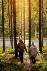 Fototapeta premium Couple walking in mountain forest