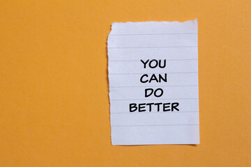 You can do better lettering on ripped paper piece with orange background. Conceptual photo. Top view, copy space.