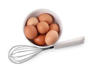 Whisk and bowl with raw eggs isolated on white, top view