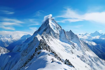 A snowy mountain peak against a clear blue sky, offering a serene and majestic background for text associated with winter and mountain adventures. Generative Ai. © Sebastian