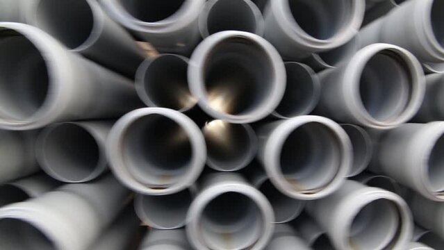 Many plastic pipes for sewage systems in warehouse