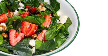 Healthy diet salad; Strawberry Spinach Salad with Avocado.