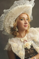 woman in fancy Victorian hat
