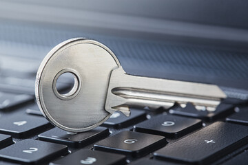 phishing, hacking personal data and money , key and hook on computer keyboard.