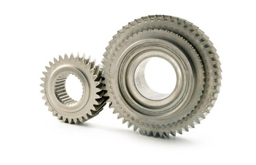 Two Gears isolated on white background, synergy concept, closeup.