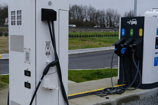 A tight shot of an electric charging station. A10 Motorway, France - January 27, 2024.
