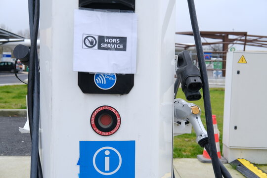 A tight shot of an electric charging station. A10 Motorway, France - January 27, 2024.