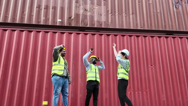 Labour labor female male person people human white yellow hardhat helmet safety uniform happy smile feeling emotional cheerful pointing finer container education study teamwork meeting professional